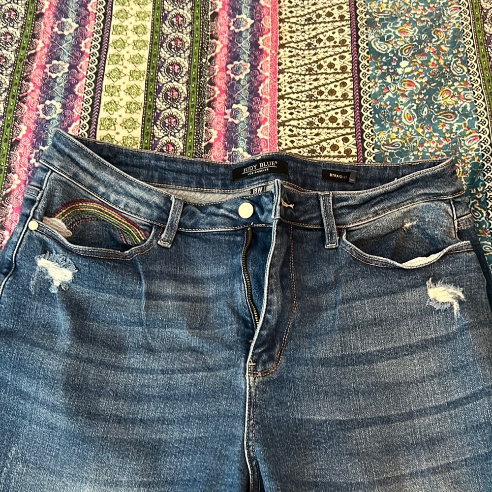 Judy Blue Boyfriend jeans. Lightly distressed with rainbow detail on pocket. 18W